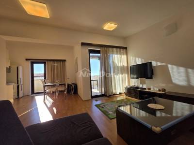 For sale two-story three-bedroom apartment with garage