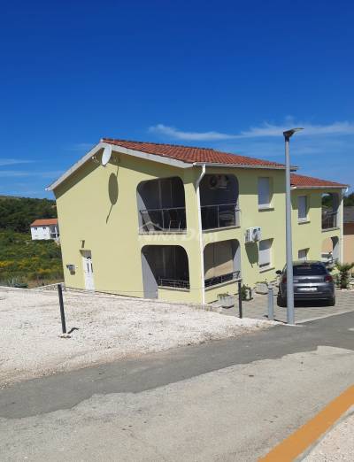 A duplex with a view of the sea