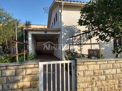 Family property with a beautiful garden.