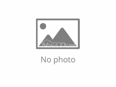 Detached property with a three-bedroom apartment and two apartments upstairs.