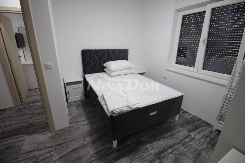 Apartmán s tromi spálňami, prízemie S2 - 5