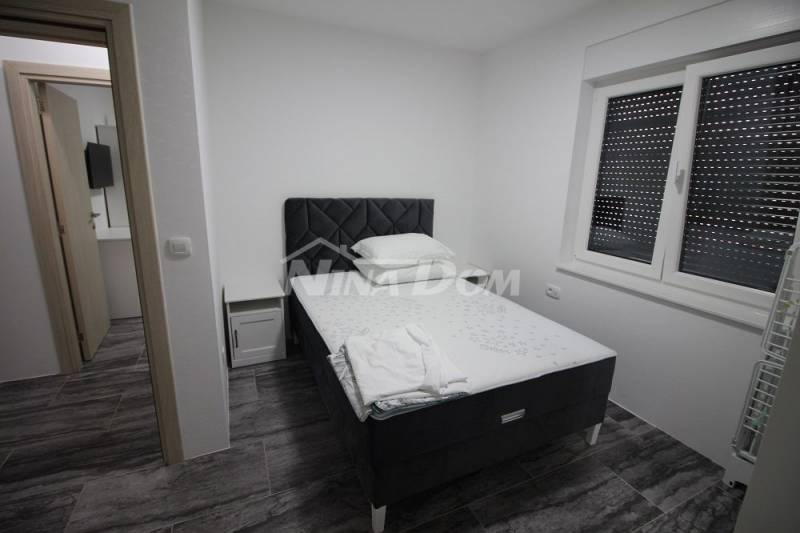 Apartmán s tromi spálňami, prízemie S2 - 6