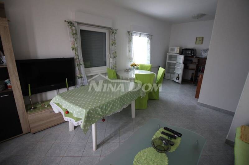 Semi-detached house, 100 m2, with a nice garden. - 12