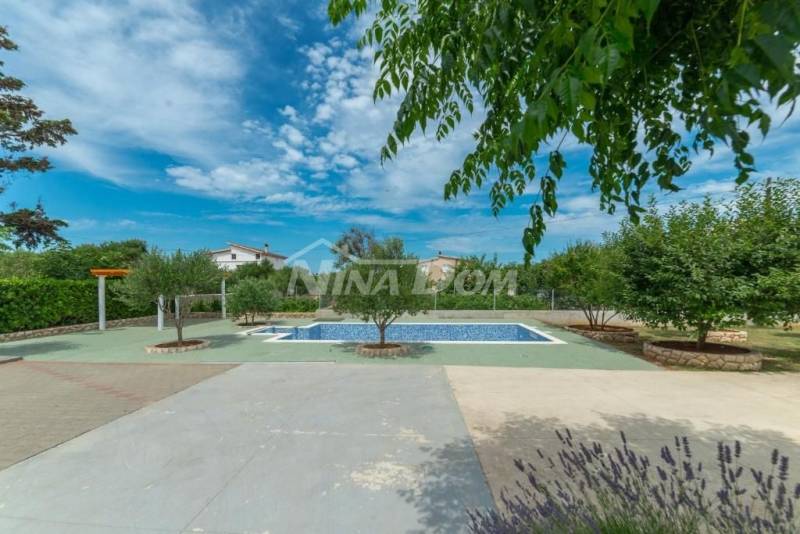 Residential and commercial building with a large garden and swimming pool - 3