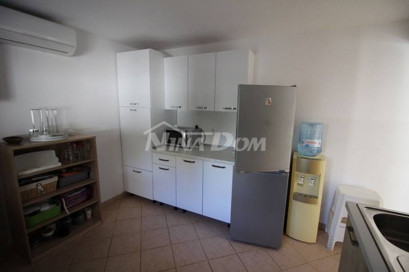 Detached property with 4 smaller residential units. - 3