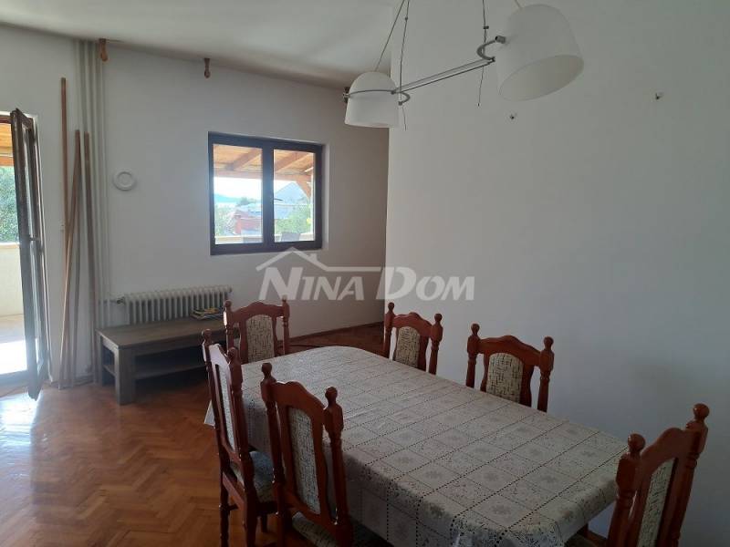 Detached house with raised ground floor, yard and garage. - 13
