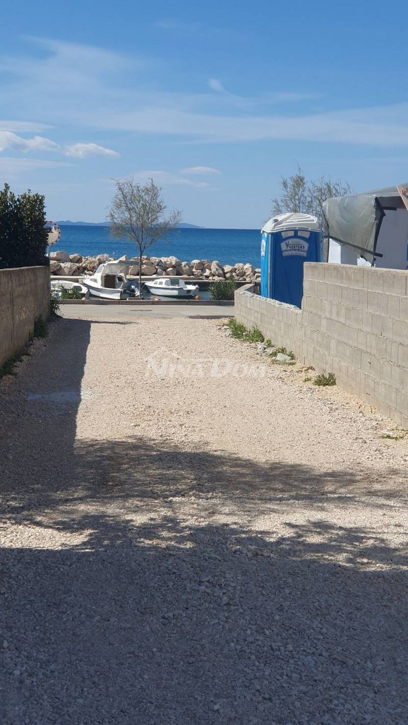  Zaton, 50 m.do mora građ. zemljište s idejnim projektom s 9 jedinica - 5