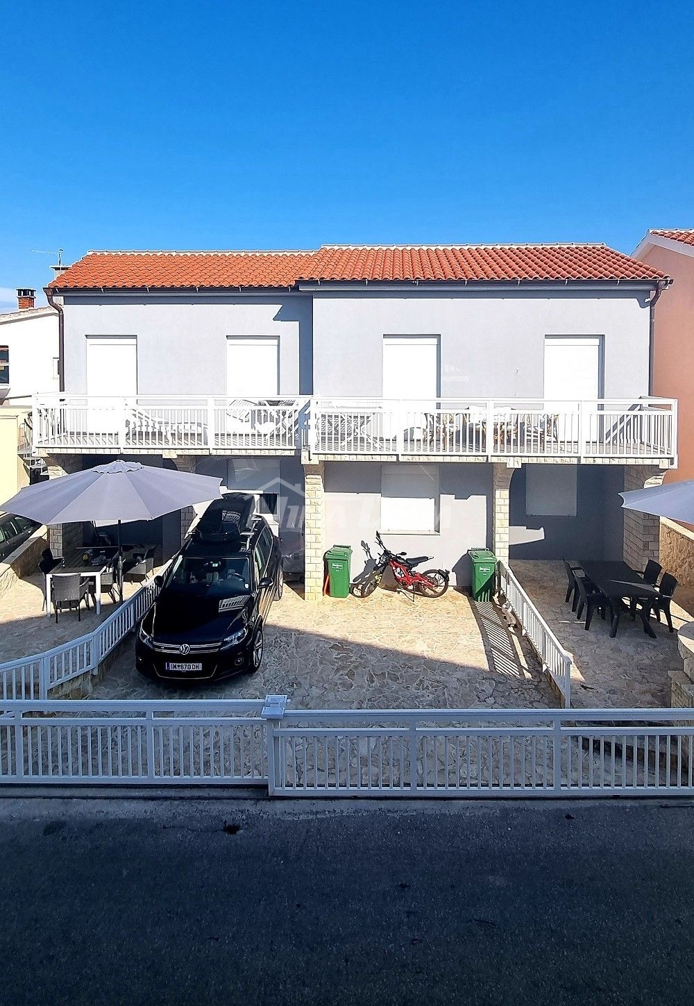 Property with two storey apartments 80 meters from the sea.
